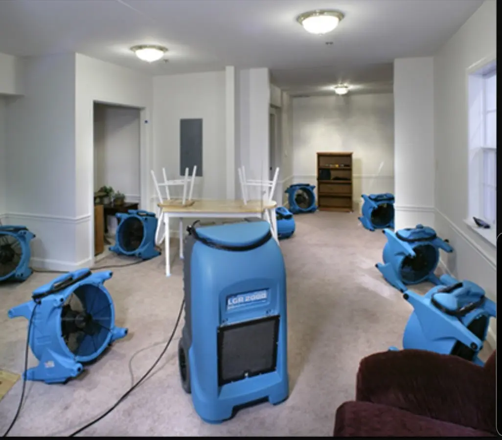 Air movers and dehumidifier setup for Water Damage Restoration in Ramona